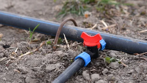 Man opens faucet on water system Stock Footage 129082433