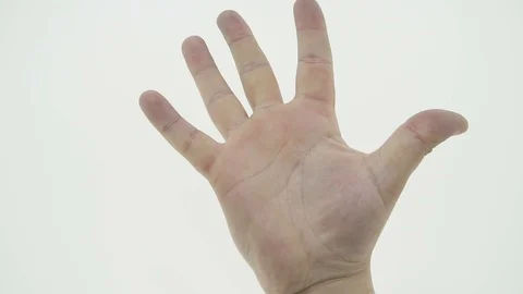 Man opens fist into palm 動画素材 106677214