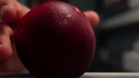 Man opens a fridge and grabs a peach at night, extreme close-up Video stock 250824162