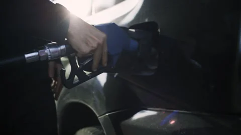 Man opens the gas tank flap of a car before refueling. Close-up 스톡 동영상 302210190