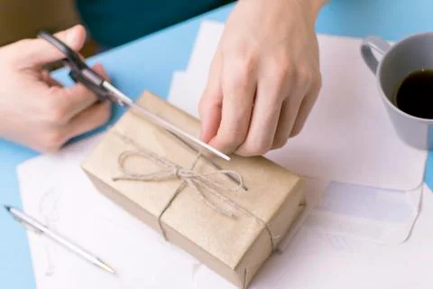The man opens the gift Stock Photos