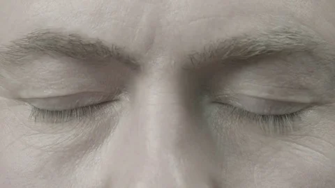 The man opens his closed eyes 스톡 동영상 74196985