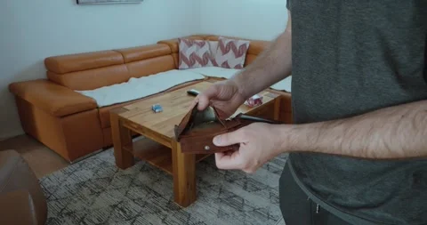Man opens his empty wallet in despair, highlighting financial struggles and.. Stock Footage 337471234