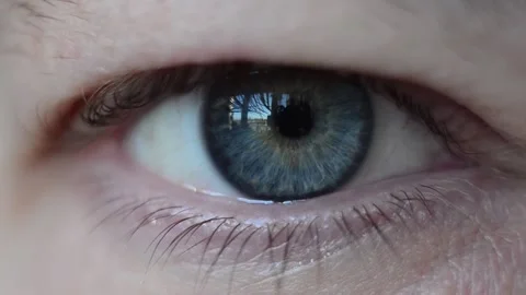 The man opens his eyes. The human eye. Video stock 200494975