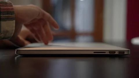 Man opens laptop in the office Stock Footage 158983234