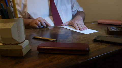 Man opens letter in his office desk Stock Footage 56739237