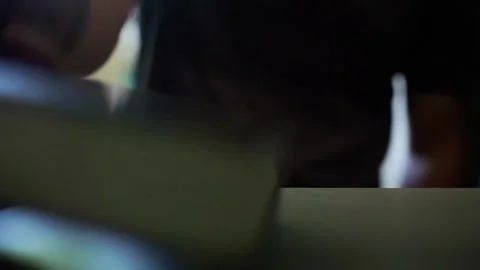 Man opens locker to put books in Stock Footage 322205582