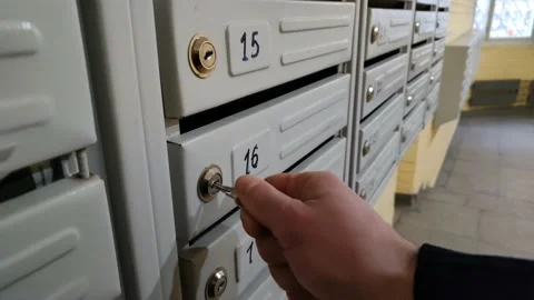 The man opens the mailbox with a key Stock Footage 177645678