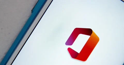 Man opens Microsoft Office App from Office Suit folder on iPhone Stock Footage 150100507