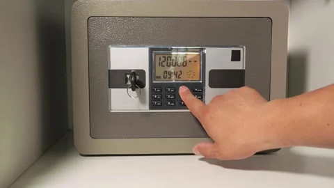 A man opens a safe and takes out Chinese cash Stock Footage 277934630