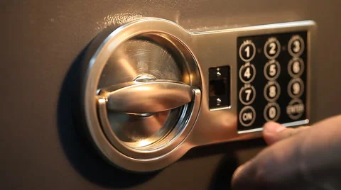 Man opens the safe with a coded lock close up Stock Footage 67477272