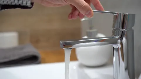 Man opens tap, washing hands, using soap close up. Prevention virus. Cleaning. Video stock 131462931