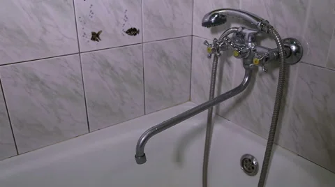 The man opens the tap water in the bathroom Stock Footage 60342111