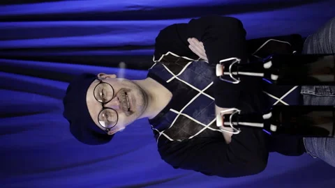 Man opens two bottles of beer. Vertically. Stock Footage 148477900