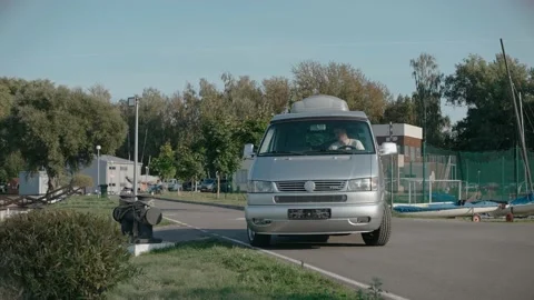 Man opens van's door for his daughter and wife, arrived at vacation spot Video stock 166547132