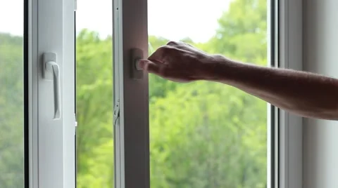Man opens a window 動画素材 64622464