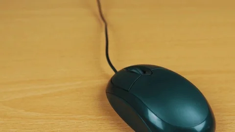 The man operates a computer mouse. Stock Footage 70592653
