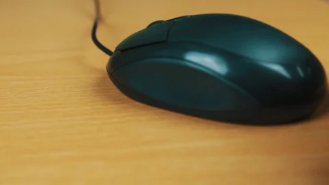 The man operates a computer mouse. Stock Footage 70593856
