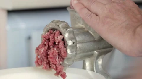 Man Operating Classic Manual Crank Meat Grinder Video stock 88072064
