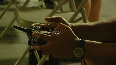 Man operating drone remote control during competition Stock Footage 99050637