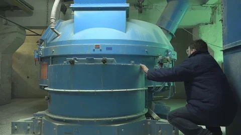 Man Operating Factory Machine Stock Footage 74950627