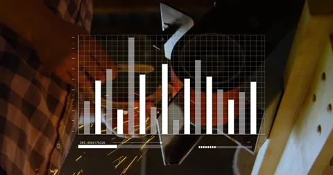 Man operating grinder in workshop, displaying manufacturing bar chart slider Stock Footage 309145740