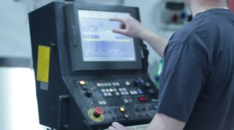 Man operating laser cutter machine Stock Footage 39667166