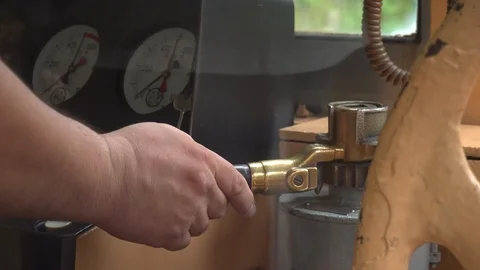 Man operating an old fashioned train cart 스톡 동영상 98655678