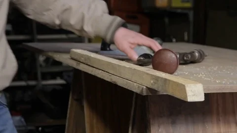 Man operating old hand drill Stock Footage 73170476