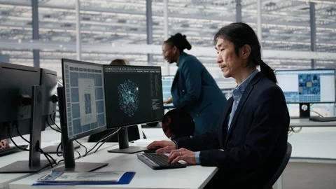 Man optimizes hardware in microchip factory office with artificial intelligence Video stock 335881571