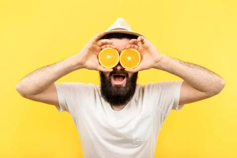 Man with orange fruit Stock Photos