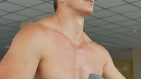 Man on the orbitrek Stock Footage 80846988