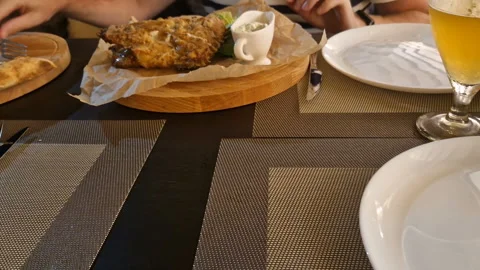 The man ordered fish in a restaurant. fish baked in the oven Stock Footage 247244784