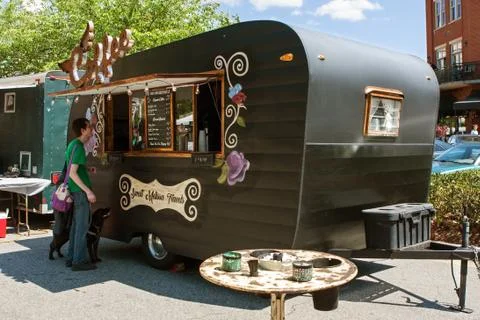 Man Orders Beverage From Coffee Themed Food Truck Stock Photos