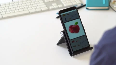 Man Orders Food or Vegetable Office In An Online Store Using A Smartphone. 스톡 동영상 145679636