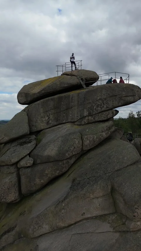 Man on the Ottofelsen viewing platform vertical Harz Germany Stockbeeldmateriaal 341282940