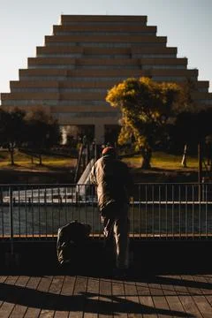 Man over looking a building Fotos de archivo