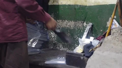 Man Packing Cleaver In A Small Factory: Lahore, Pakistan. 25 Dec 2025 Stock Footage 324916033