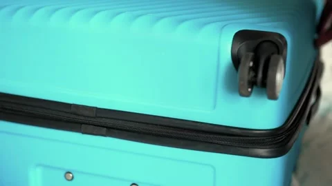 Man packing a suitcase for trip closeup. Travel concept slow motion. Stock Footage 301558518