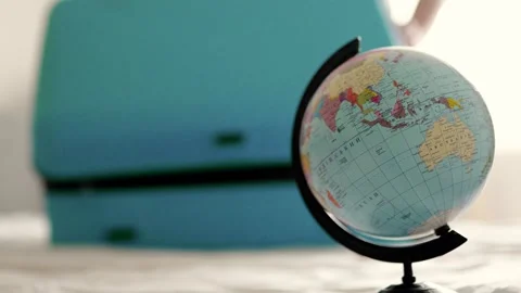 Man packing a suitcase for trip closeup. Travel concept slow motion. Stock Footage 301558523