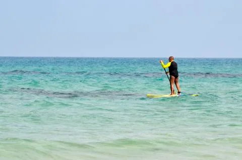 Man with a paddle Stock Photos