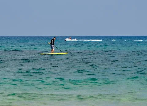 Man with a paddle Stock Photos