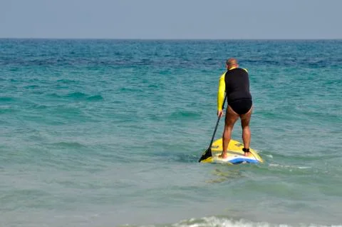 Man with a paddle Stock Photos