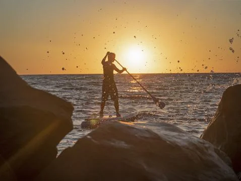 Man with paddle 스톡 사진