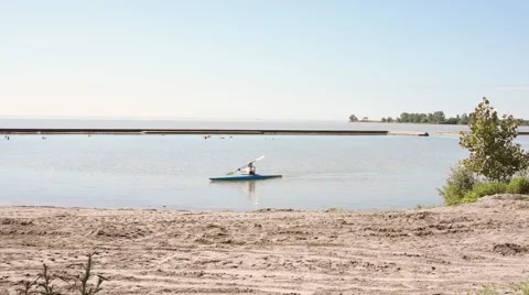 Man Paddling in Kayak Stock Footage 40329420