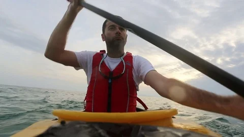 Man paddling the kayak Stock Footage 77009818