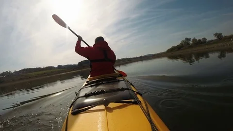 Man paddling the kayak Stock Footage 81586895