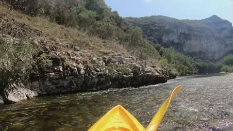 Man paddling in narrow Stock Footage 137397908