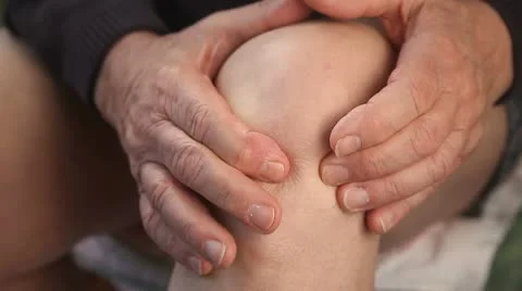 Man with a painful knee Stock Footage 10797798