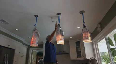 MAN PAINTING CEILING 2 Stock-Footage 28837309